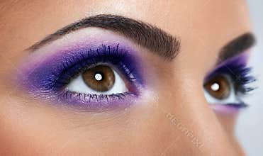 Eyes with purple makeup
