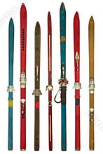 Vintage colorful used skis isolated on white
