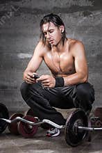 Handsome crouched athlete