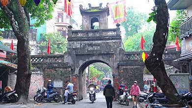 Busy traffic at Quan Chuong Gate in Hang Chieu Street, close to the Red River dyke