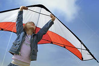 Child flying with a kite