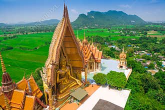 Big golden Buddha in temple, Kanchanaburi Thailand