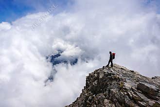 Man on top of mountain