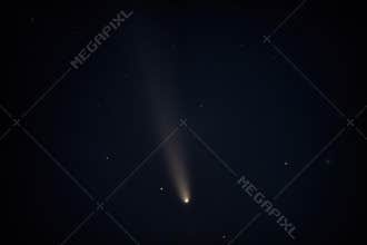 A comet soars through the night sky