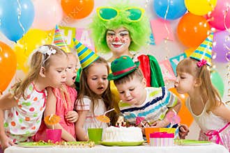 Kids with clown celebrating birthday party