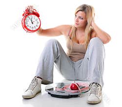 Time for diet slimming. Large girl with scale.