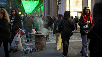 Paris, France: October 25, 2023: Crowd of busy people strolling european city streets. Concept of evening in Paris