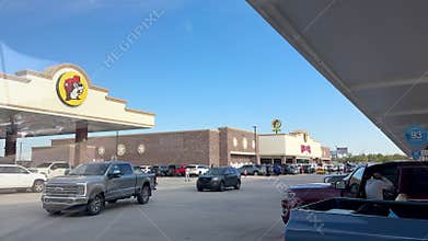 The exterior of a Buc ees gas station, fast food restaurant, and convenience store
