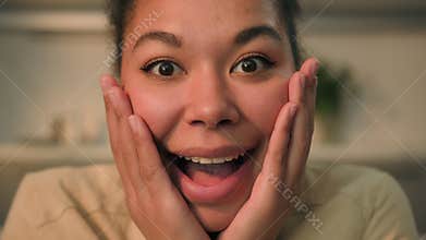 Close up happy woman African American ethnic girl shocked amazed astonished face expression open mouth big eyes wow