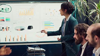 Team of business colleagues discussing agenda for upcoming events