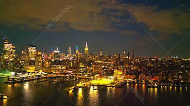 New York City Skyline at dusk night aerial view. NYC near night from drone. Famous New York City skyline, cityscape of