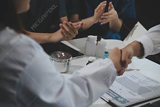Doctor handshake and partnership in healthcare, medicine or trust for collaboration, unity or support.Team of medical experts