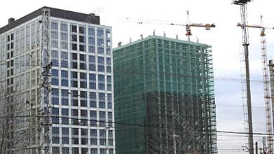 Panorama of two constructing highrise buildings