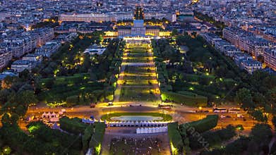 Aerial view of a large city skyline after sunset day to night timelapse. Top view from the Eiffel tower. Paris, France.
