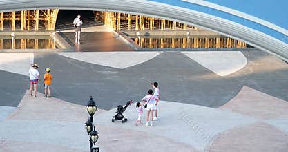 Phu Quoc Island Vietnam 06.16.2024 family dressed alike man woman and child with stroller walking in park relaxing