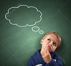 Thinking with thought bubble on blackboard