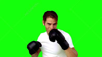 Sportsman boxing in front of the camera