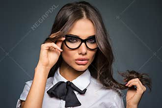 brunette young business woman wearing diopter glasses