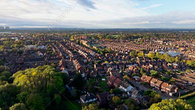 Aerial view above suburban generic terraced houses in UK