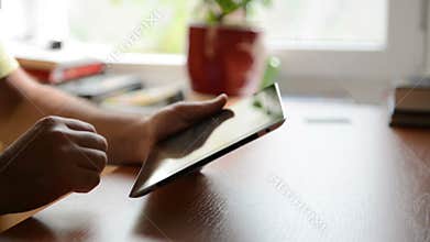 Man working on a tablet PC