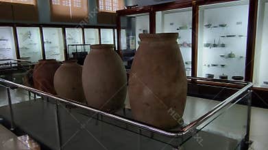 Large Gandharan Storage Jars and Buddhist Artifacts from Ancient Taxila Preserved in Historic Museum