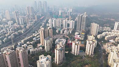 Aerial shot of Thakur Village, a large residential township in Mumbai at the foothills of a national park
