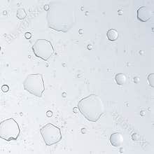 Close-Up of Broken Transparent Surface Featuring Cracks and Moisture