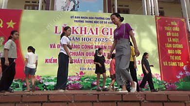Vietnamese schoolgirls are practicing performing arts to prepare for the opening day of the new school year