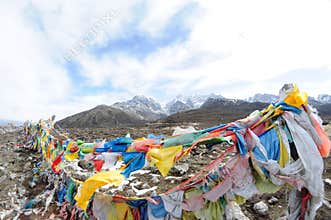 Prayer flags with snow mountais