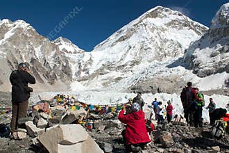 Everest base camp, khumbu glacier and tourists celebrate Everest base camp -15th of NoVember 201
