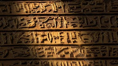 Light spot moving on egypt hieroglyphics