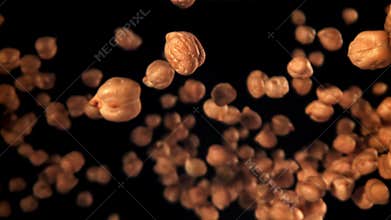 Chickpeas fly and fall. Filmed on a high-speed camera at 1000 fps.