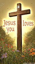 Wooden cross with the words Jesus loves you written below it