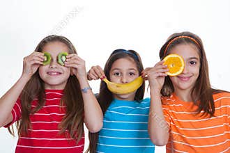 Kids with healthy diet of fruit.