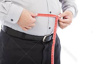 Fat business man use scale to measure his waistline