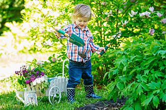 Child digging in the garden
