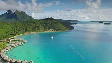 Aerial view of tropical Bora Bora island in French Polynesia, famous overwater bungalow resorts