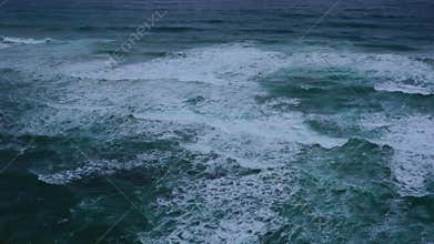 View of rock cliff and the surf at the Twelve Apostles or Twelve Rocks in Port Campbell National Park.