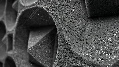 Closeup of dense foam panels installed in a voice booth showcasing texture and effectiveness in absorbing sound for