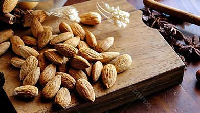 Delicious Almonds on Wooden Board