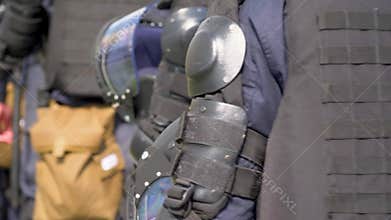 Security officers protect crowd in public street