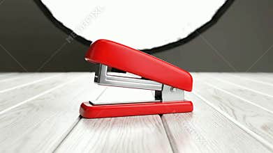 Red Paperclips and Blue Highlighters Arranged on White and Black Checkered Surface with Soft Lighting
