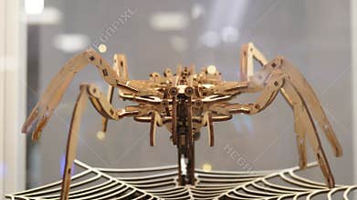 Elegant Mechanical Spider Demonstrating Robotics And Craftsmanship, Intricate Wooden Robot Spider Stepping Rhythmically