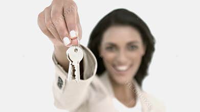 Estate agent showing house keys