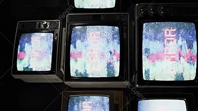 Retro TV Wall Shows Error Message with Analog Glitch
