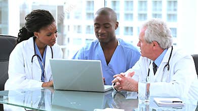 Happy doctors talking to each other