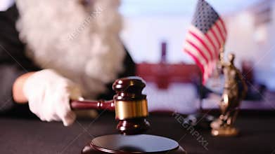 American judge striking gavel in a courtroom