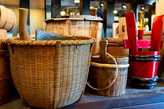 Collection of Traditional Japanese Bamboo Baskets and Wooden Tubs