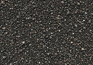 Wet Sand Texture Background with Small Pebbles and Natural Surface Detail