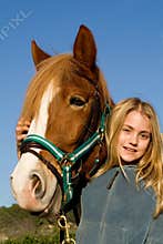 Child with pet horse